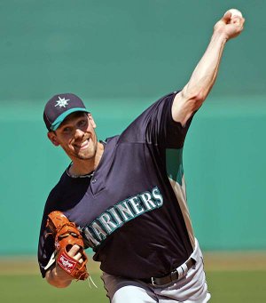  Seattle Mariners' pitcher Cliff Lee delivers against the Arizona Diamondbacks during a spring baseball game at Tucson Electric Park on  Monday