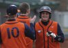 HERITAGE’S HERO - Rogers Heritage’s Reed Brown, right, is congratulated by teammates after hitting a home run during the Best Sports Classic on Saturday at Veterans Park in Rogers. Brown leads the team in home runs and runs batted in this season.