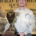 Stephan Richardson of Springdale shows his trophy after winning the gobbling division of the Nationa...