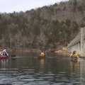 Paddlers, from left, Judy Combs, Pat Costner, Warren Cunningham and Doug Powell glide past the Lake ...
