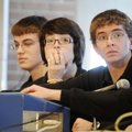 Bentonville High School's Hunter Gab, from right, Annie Barry, and Alex Eng, wait to answer a questi...
