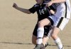 Bentonville freshman Lauren Cowgur, right, battles with Fort Smith Northside junior Katie Fulmer for the ball during the first half Thursday in Bella Vista.