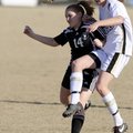 Bentonville freshman Lauren Cowgur, right, battles with Fort Smith Northside junior Katie Fulmer for...