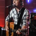 Country singer Dierks Bentley performs "Feel That Fire", the title song from his latest CD, during h...