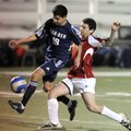 Springdale Har-Ber’s Jorge Gonzalez, left, sprints to make a shot on the goal as Fort Smith Northsid...