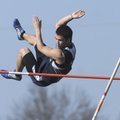 Springdale Har-Ber’s Shawn Sayarinh clears the bar during the pole vault competition at the Tiger Re...