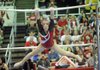   University of Arkansas gymnast Natalie Bohonsky performs on the bars during Friday nights meet against Oklahoma at Barnhill Arena in Fayetteville. 