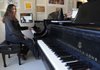    University of Arkansas Junior Rocio Pavlina Martinez Rendis from Yucatan, Mexico plays on one of the Steinway pianos in the music building Friday afternoon.