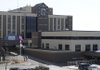 NORTHWEST HEALTH SYSTEM - Pedestrians walk to and from the main entrance Friday of the Northwest Medical Center- Springdale. The Northwest Health System chief executive officer Doug Arnold and chief financial officer Eddie Klein resigned Thursday effective immediately.