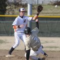  Rogers Heritage’s Hunter Wood gets a forceout on Neosho, Mo., runner Alex Wise at Veterans Park in ...