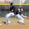  Bentonville’s Mitchell Mawby, left, steals second against Miami, Okla., player Matt Walker during F...
