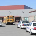 NOTHING FOUND - Several Fayetteville Police Department vehicles park along the entrance to Holt Midd...