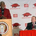  University of Arkansas Athletic Director Jeff Long listens as former coach Nolan Richardson talks t...