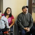 The Hernandez family from left, Aaron, Maricela, Miguel, and Rudy sit in the apartment Wednesday the...