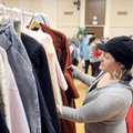 Shaila Witt and hundreds of others ignored deteriorating weather Saturday to look for bargains at th...