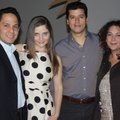  Andres Lopez and Martha Trevino Lopez, from left, visit with Manuel Haro and Arantxa Castillo-Haro...