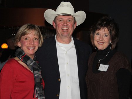 
                            
Kathy and Ted Wade, from left, and Debby Furry help support CASA at the March 13 Construction Bash.