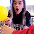 Lillian Larson, 11, gasps when a wooden structure she is helping to build begins to fall at a practi...