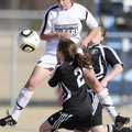 Bentonville junior Alyssa Hymas, top, battles with Fort Smith Northside sophomore Taylor Mulhern for...