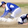 Rogers High third baseman Alex Shelor, top, tries to tag Har-Ber’s Brandon Jansen out during the six...
