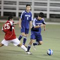 Springdale Har-Ber’s Mauricio Salas, right, moves the ball upfield as Fort Smith Southside’s Gustavo...