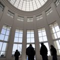 Construction crews meet Monday in the lobby of the new addition of Springdale High School.