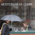 MIDDAY MEAL - Leslie Bennoch of Fayetteville enjoys a quiet lunch at Emelia’s Mediterranean Kitchen ...
