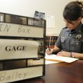 Deputy Shannon Bailey, with the Benton County Sheriff’s Office, closes out a writ of execution Thurs...