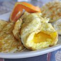 The Corner Omelet is served with hash brown potatoes and an English muffin at the ROTC/Grill in Faye...