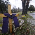 A Lenten cross marks the corner of Arkansas 45 and Hidden Springs Road in Fayetteville. Draped in pu...