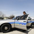 Springdale officer Blake Reed gets into his patrol car Tuesday to begin his shift. Area police depar...