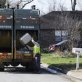 TAKING OUT THE TRASH - Waste Management picks up recyclables on Ladawn Avenue in Springdale on Frida...