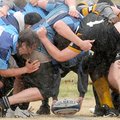A ball is rolled under a scrum between the Benton County Blues and Little Rock Central during a Marc...