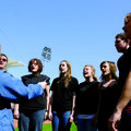 
Members of the Benton County School of the Arts' show choir perform the national anthem Saturday a...