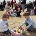  
Tia Thompson,5, and her brother Taylor Thompson,9, go through their Easter eggs Sunday afternoon ...