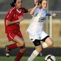 Bentonville’s Maddy Goss, right, fights for control of the ball against Green Forest’s Irma Castillo...