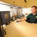 Jak Kimball, information technology manager for the Washington County Sheriff’s Office, manages the ...