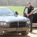 Benton County and McDonald County, Mo., sheriff’s deputies meet Monday at Arkansas 265 and Patterson...