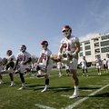 Arkansas players participate in a drill during the first day of spring football practice Tuesday in ...