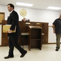 Benton County deputy prosecutor Kip Whittemore, left, walks out of the courtroom Tuesday after Lowel...