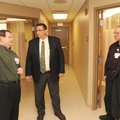 Douglas Beecher, office manager for Area Health Educators Centers-Northwest, left, gives a tour Tues...
