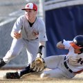 Rogers Heritage’s Brandon Brzozkiewicz safely steals third base as Fort Smith Northside’s Evan Bell ...