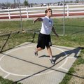 Springdale High junior Tiffany Wiseley practices the discus Wednesday at Joe Roberts Track in Spring...
