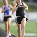 Bentonville’s Kelsey Wheelhouse rounds the curve and heads into the front stretch on her way to winn...