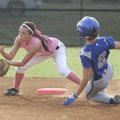 VICTORIOUS IN PINK - Bentonville’s Meg McGuirt fields a throw from the catcher Thursday before taggi...