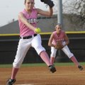 Bentonville’s Kaisha Arnold pitches against Rogers High Thursday in Bentonville.