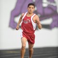 Springdale junior Gabe Gonzalez rounds the final curve before winning the 1,600-meter run during the...