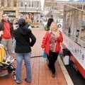 FIRST FRIDAY - Sue Ann Overstreet gets a freshly grilled chocolate and hazelnut crepe Friday from Cr...