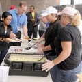 SAM’S SERVICE - Sam’s Club Logistics Division employees Tanesha Marshall, left, and Roger Craven are...
