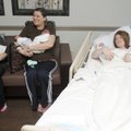 ‘DOUBLE BLESSINGS’ - Dinara Sallikhova, from left, holds her twins, Sitora and Samandar, Michelle Po...